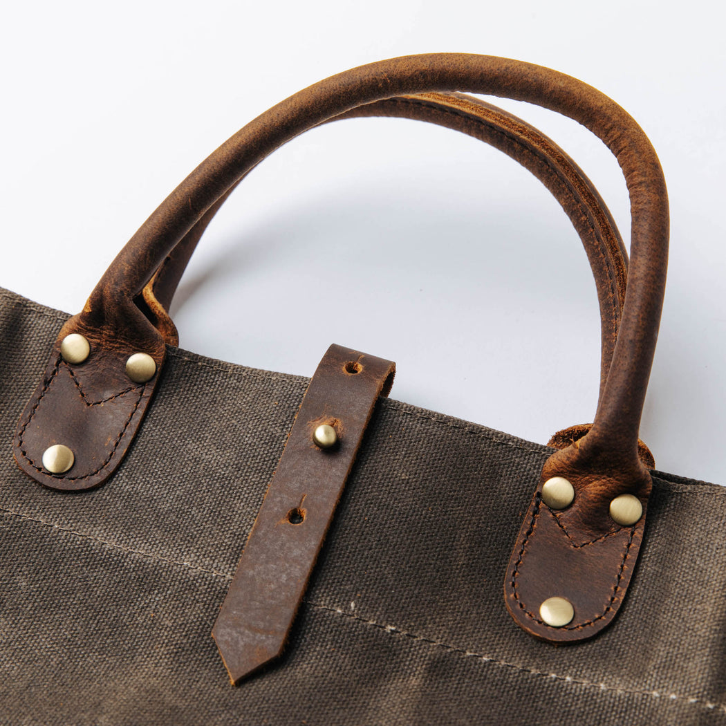 Common Goods Waxed Canvas Firewood Carrier - handles