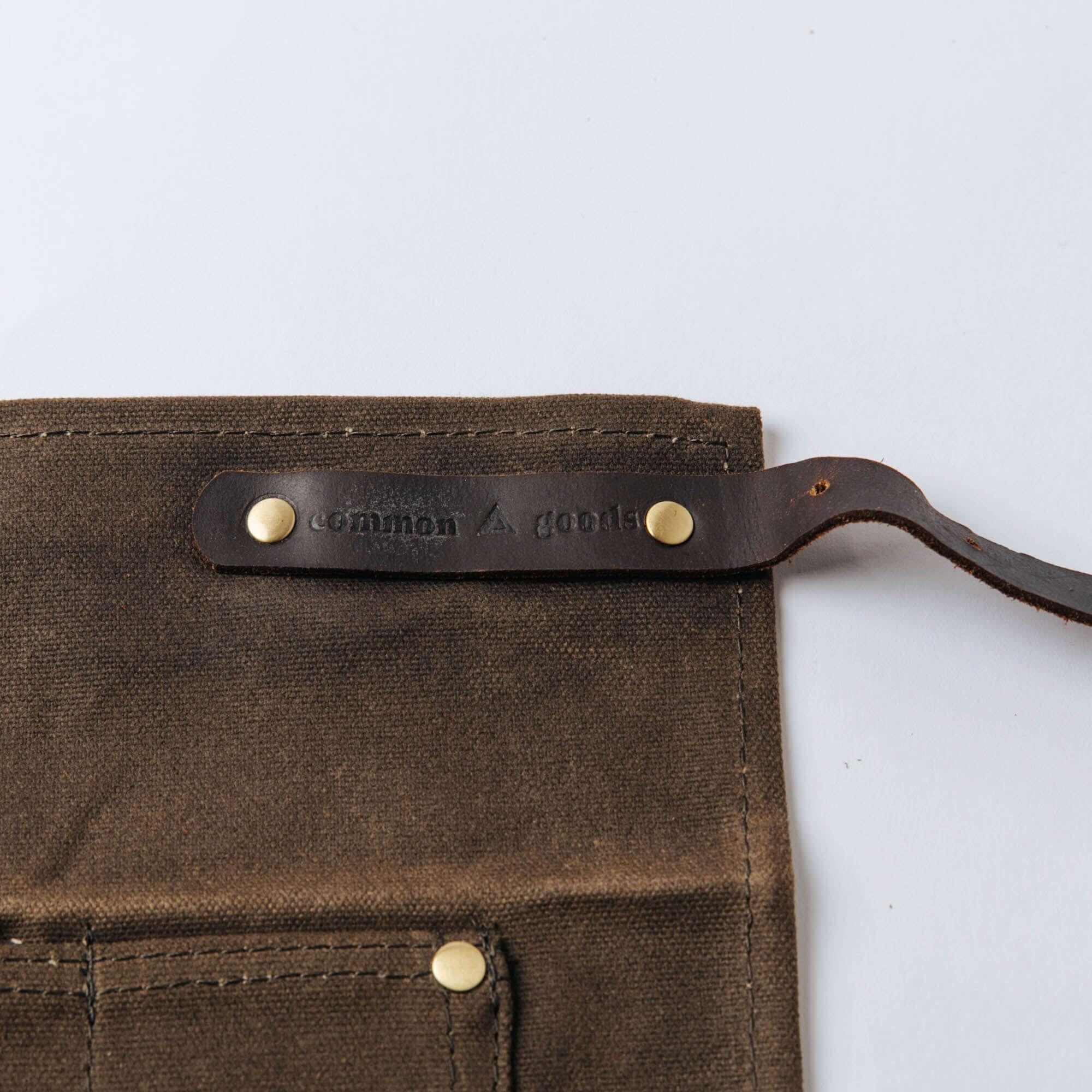 Common Goods Waxed Canvas Waist Apron - label